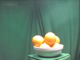 135 Degrees _ Picture 9 _ White Ceramic Bowl Filled with Oranges.png